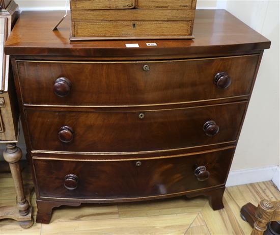 A Regency mahogany bowfronted chest of three long drawers W.91cm